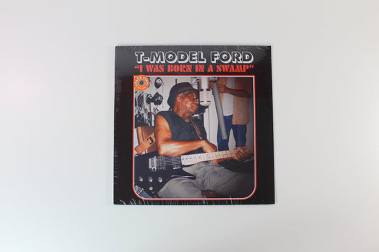T-Model Ford - I Was Born In A Swamp on Alive Naturalsound Records - Red Vinyl Sealed